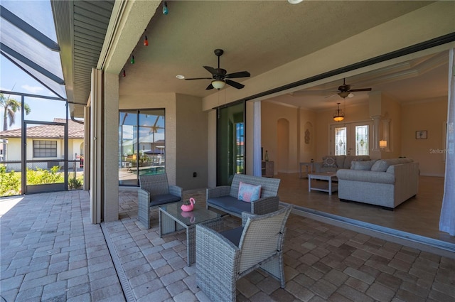 2736 Magdalina Dr, Punta Gorda, FL 33950 - view of patio featuring french doors, a lanai, ceiling fan, and an outdoor living space