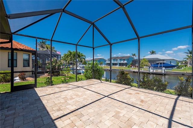 2736 Magdalina Dr, Punta Gorda, FL 33950 - view of patio / terrace with a residential view, a lanai, and a water view