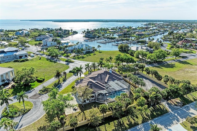 bird's eye view with a water view