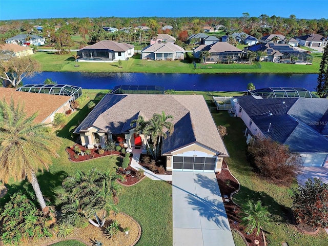 drone / aerial view with a water view