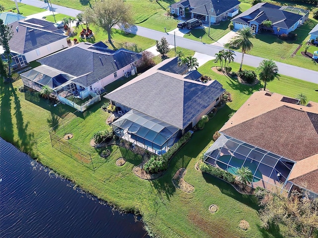 bird's eye view with a water view