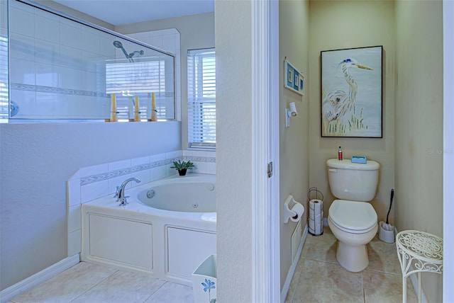 bathroom featuring toilet, tile patterned floors, and independent shower and bath