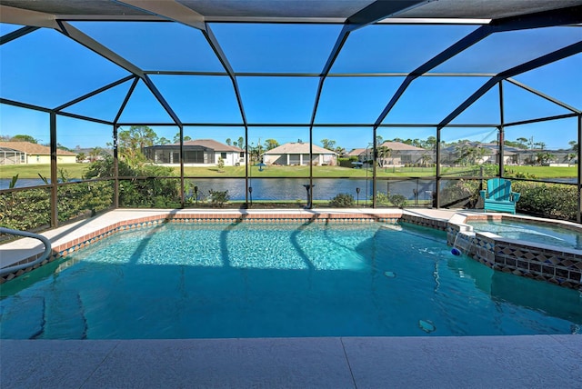 view of pool featuring an in ground hot tub, a lanai, and a water view