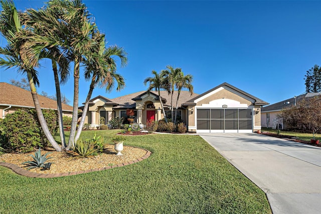 ranch-style home featuring a garage and a front lawn