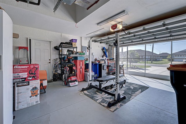 garage with a mountain view and a garage door opener