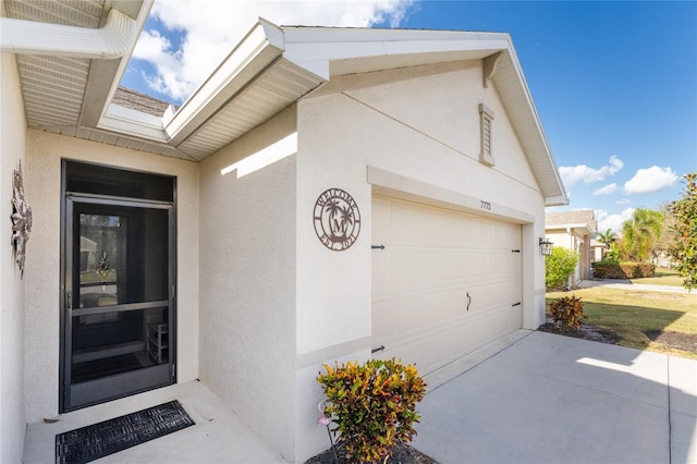 property entrance featuring a garage