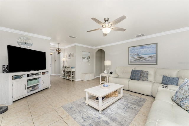 living room featuring ceiling fan, light tile patterned floors, and crown molding