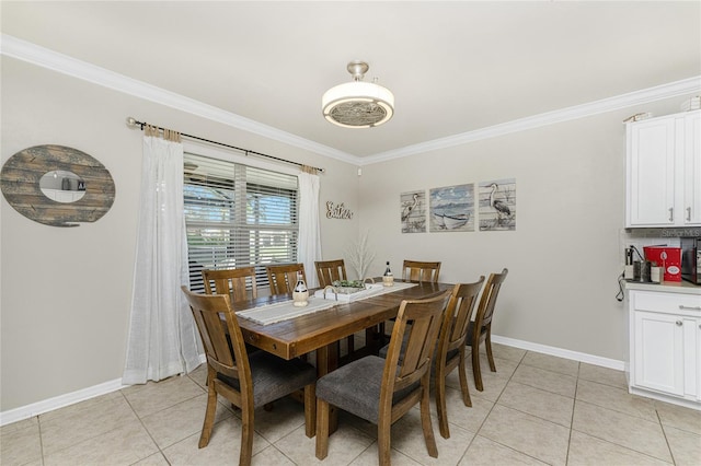 dining room featuring light tile patterned flooring and crown molding