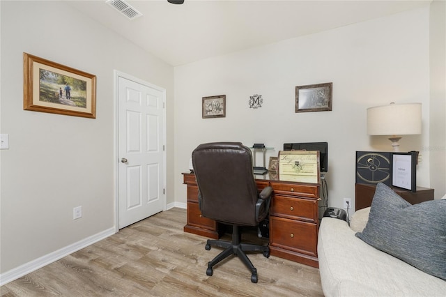 office space featuring light hardwood / wood-style flooring