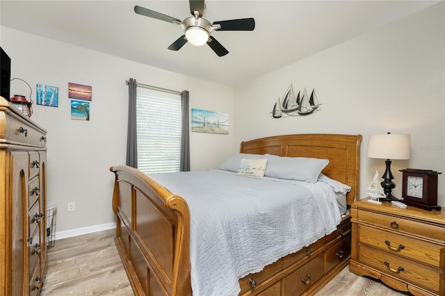 bedroom featuring ceiling fan and light hardwood / wood-style floors