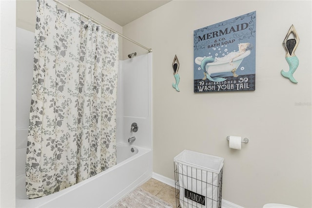 bathroom featuring tile patterned floors and shower / tub combo with curtain