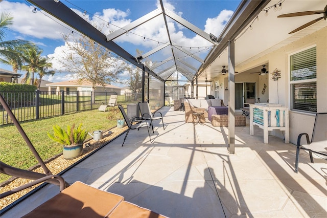 view of patio featuring an outdoor hangout area, a lanai, and ceiling fan