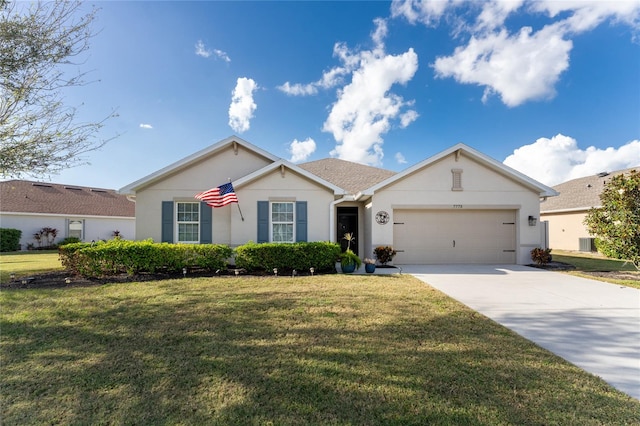 ranch-style home with a garage and a front lawn