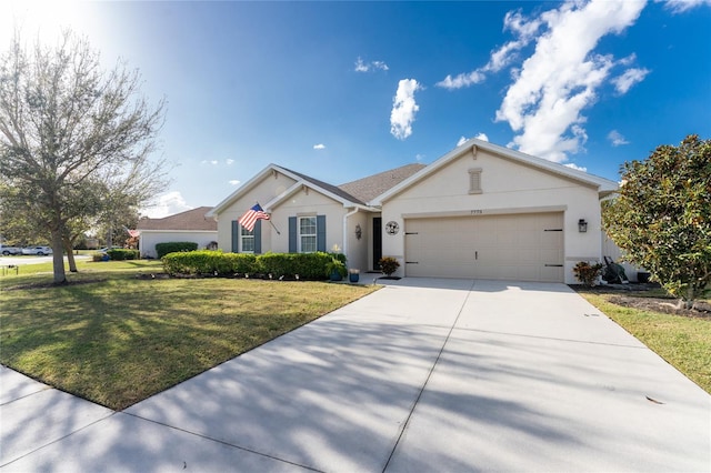 single story home featuring a garage and a front lawn