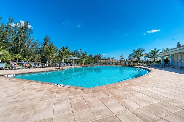 view of swimming pool featuring a patio area