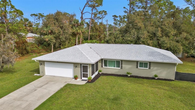 ranch-style house with a garage and a front yard