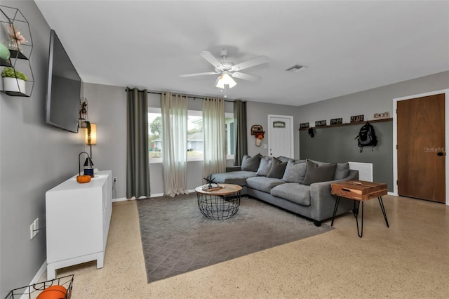 living room with ceiling fan