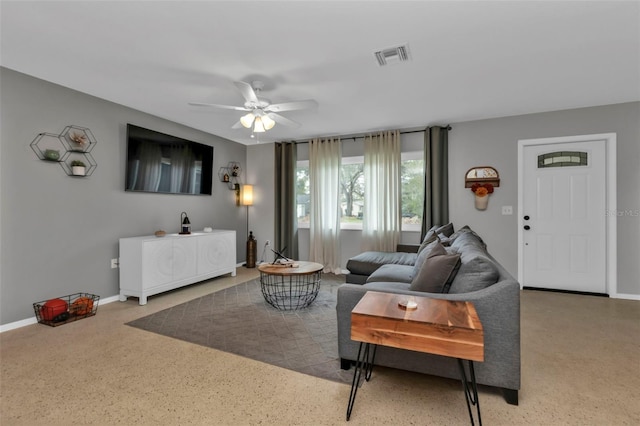 living room featuring ceiling fan