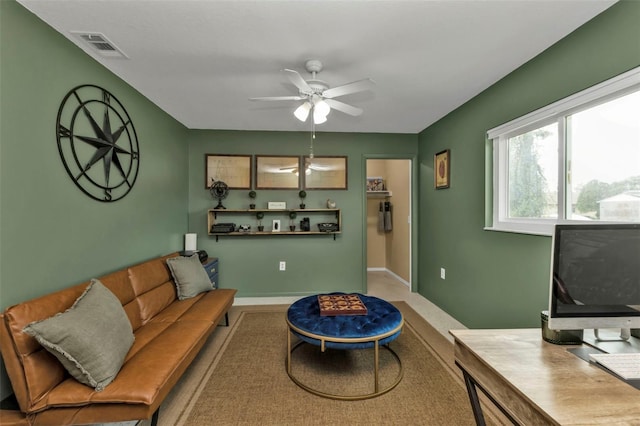 living room with ceiling fan