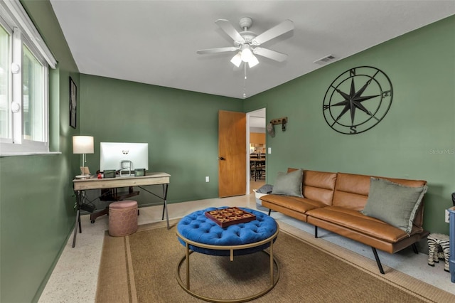 living room with ceiling fan