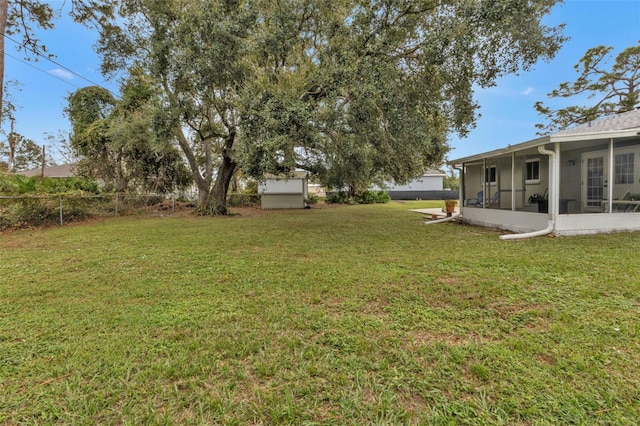 view of yard featuring a sunroom