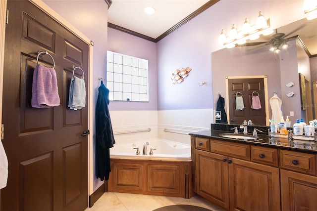 bathroom with tile patterned flooring, ornamental molding, vanity, a bath, and ceiling fan