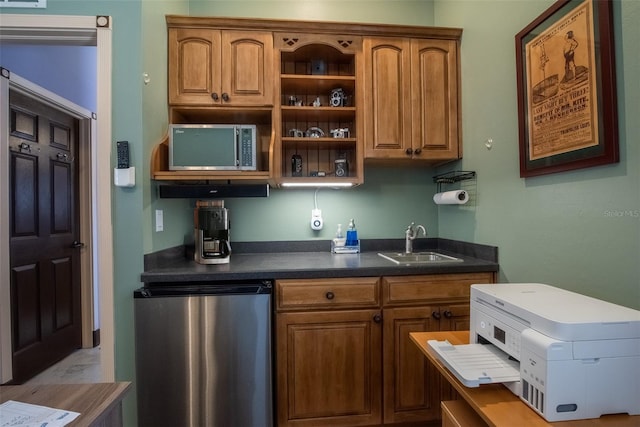 kitchen featuring appliances with stainless steel finishes and sink