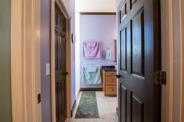 bathroom with tile patterned floors