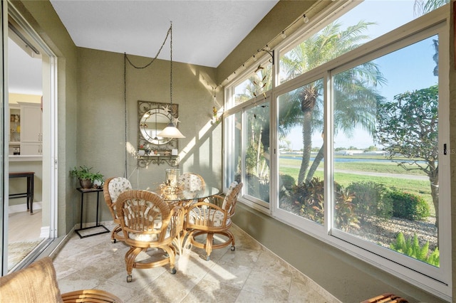 sunroom / solarium with a healthy amount of sunlight