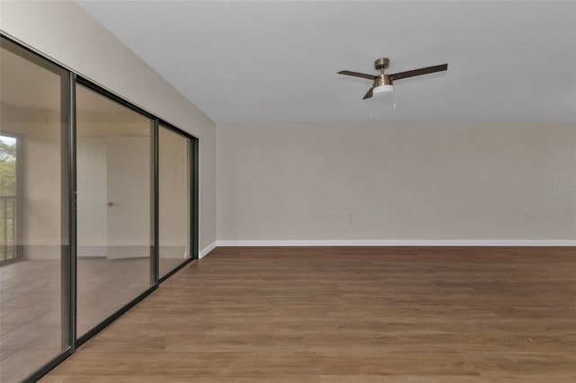 unfurnished bedroom with light hardwood / wood-style floors, a closet, and ceiling fan