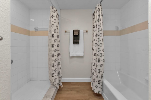 bathroom with hardwood / wood-style floors