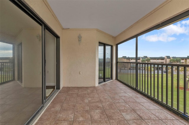 unfurnished sunroom featuring a wealth of natural light