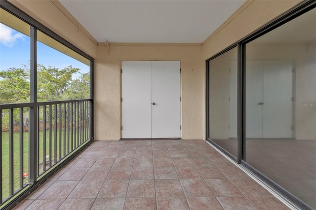 unfurnished sunroom with a wealth of natural light