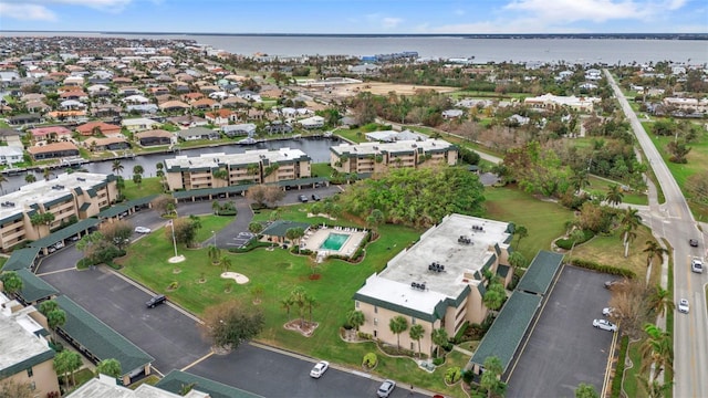 drone / aerial view with a water view