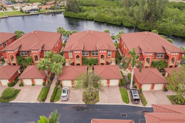 drone / aerial view featuring a water view