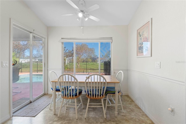 dining space featuring ceiling fan