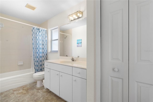 full bathroom with toilet, vanity, and shower / bath combination with curtain