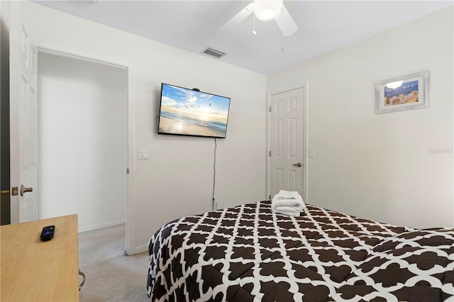 bedroom featuring ceiling fan and light colored carpet