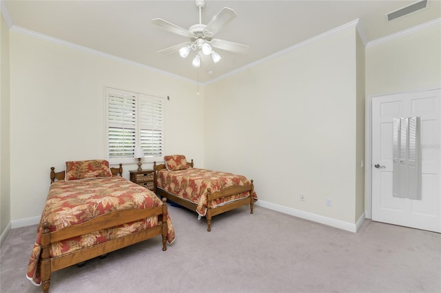 bedroom featuring light colored carpet, ceiling fan, and crown molding