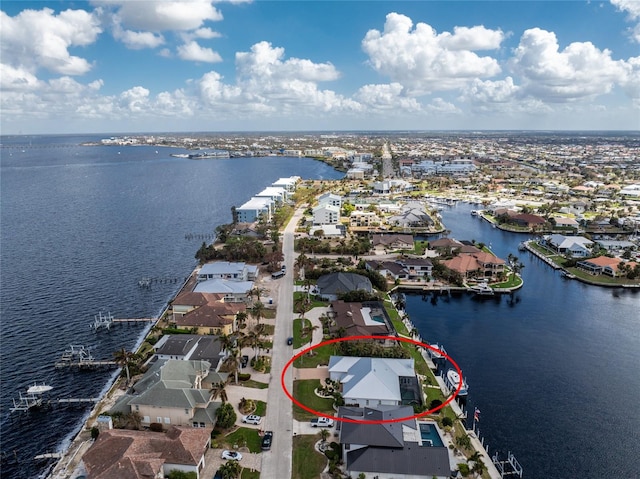 bird's eye view with a water view