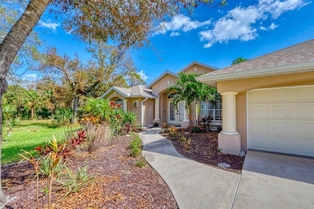 view of front of property featuring a garage