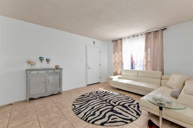 tiled living room with a textured ceiling