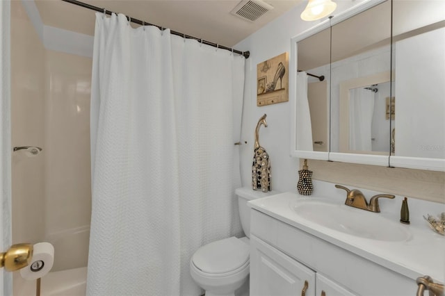 full bathroom featuring toilet, shower / bath combo, and vanity