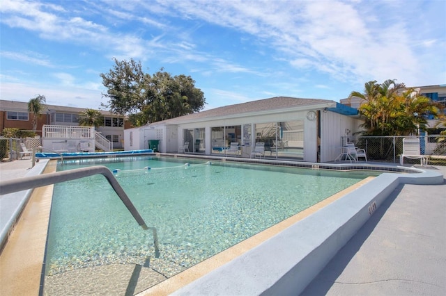 view of swimming pool featuring a patio