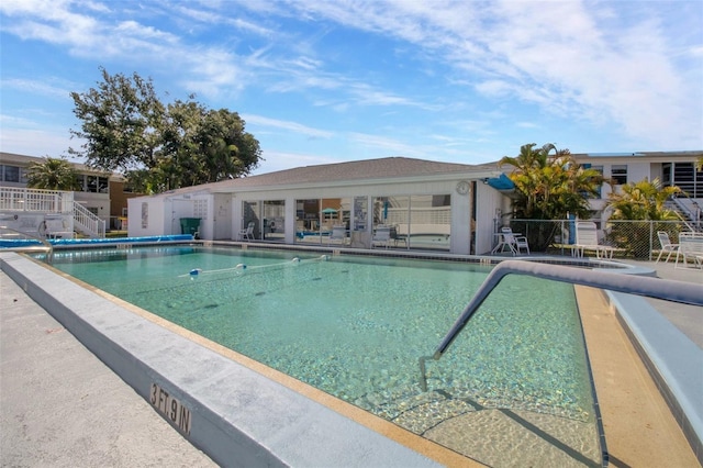 view of swimming pool featuring a patio