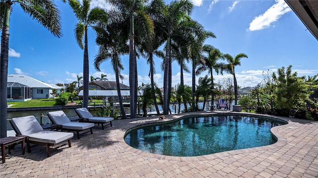 view of pool featuring a patio area