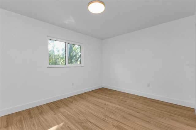 empty room with light wood-type flooring