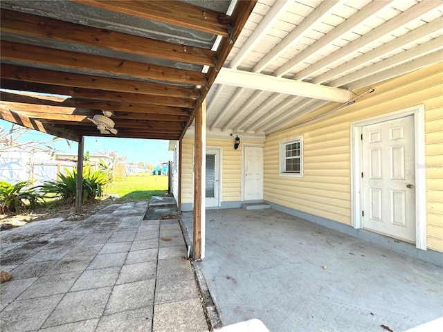 view of patio / terrace featuring ceiling fan