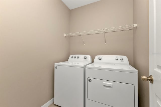 laundry area featuring separate washer and dryer