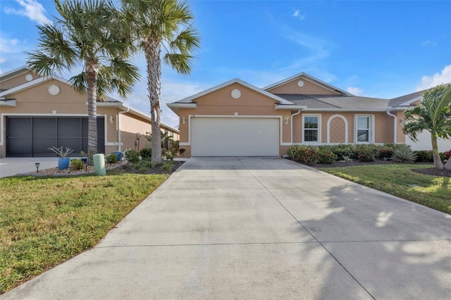 single story home featuring a garage and a front lawn